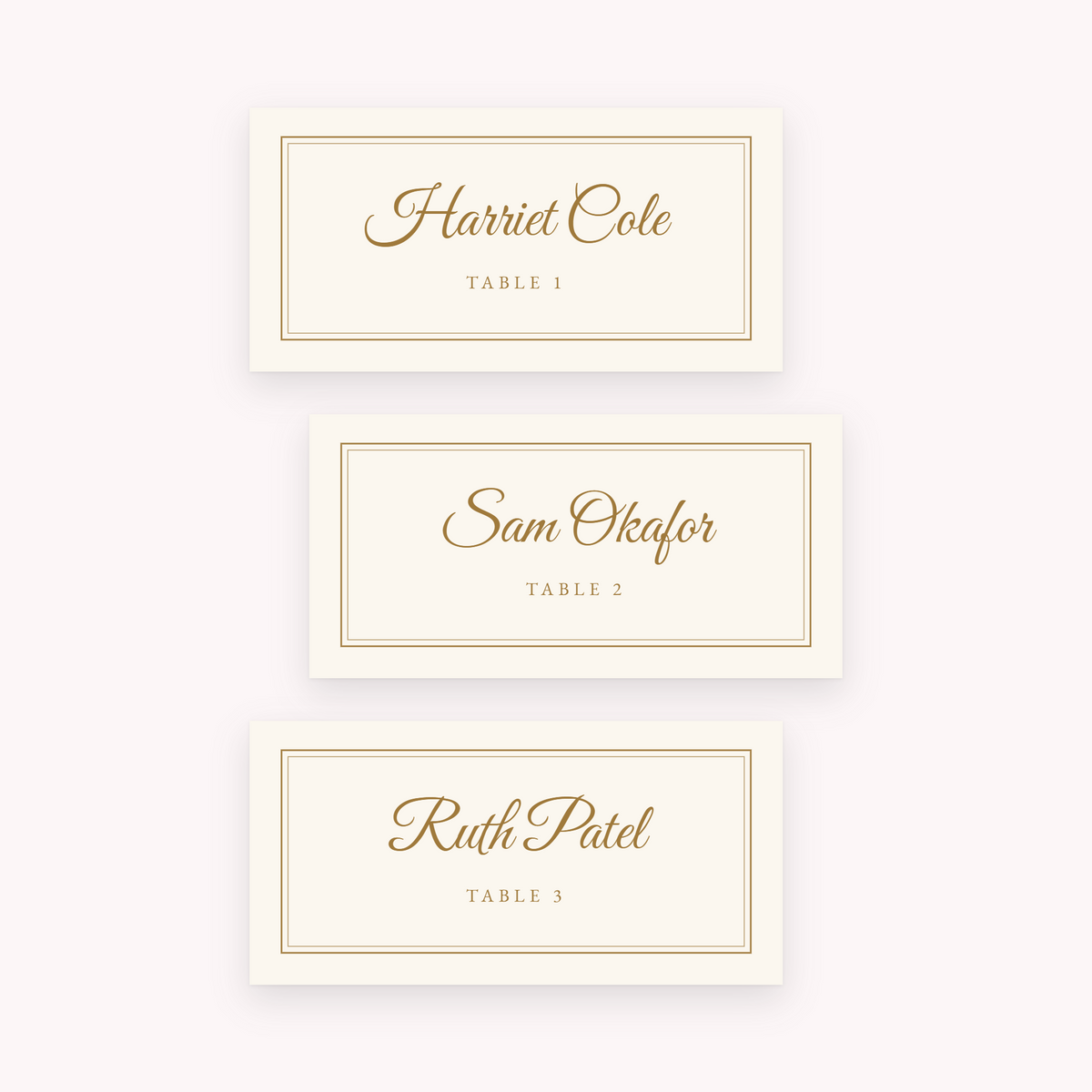Gilt place cards, shown with the sample names Olivia & James