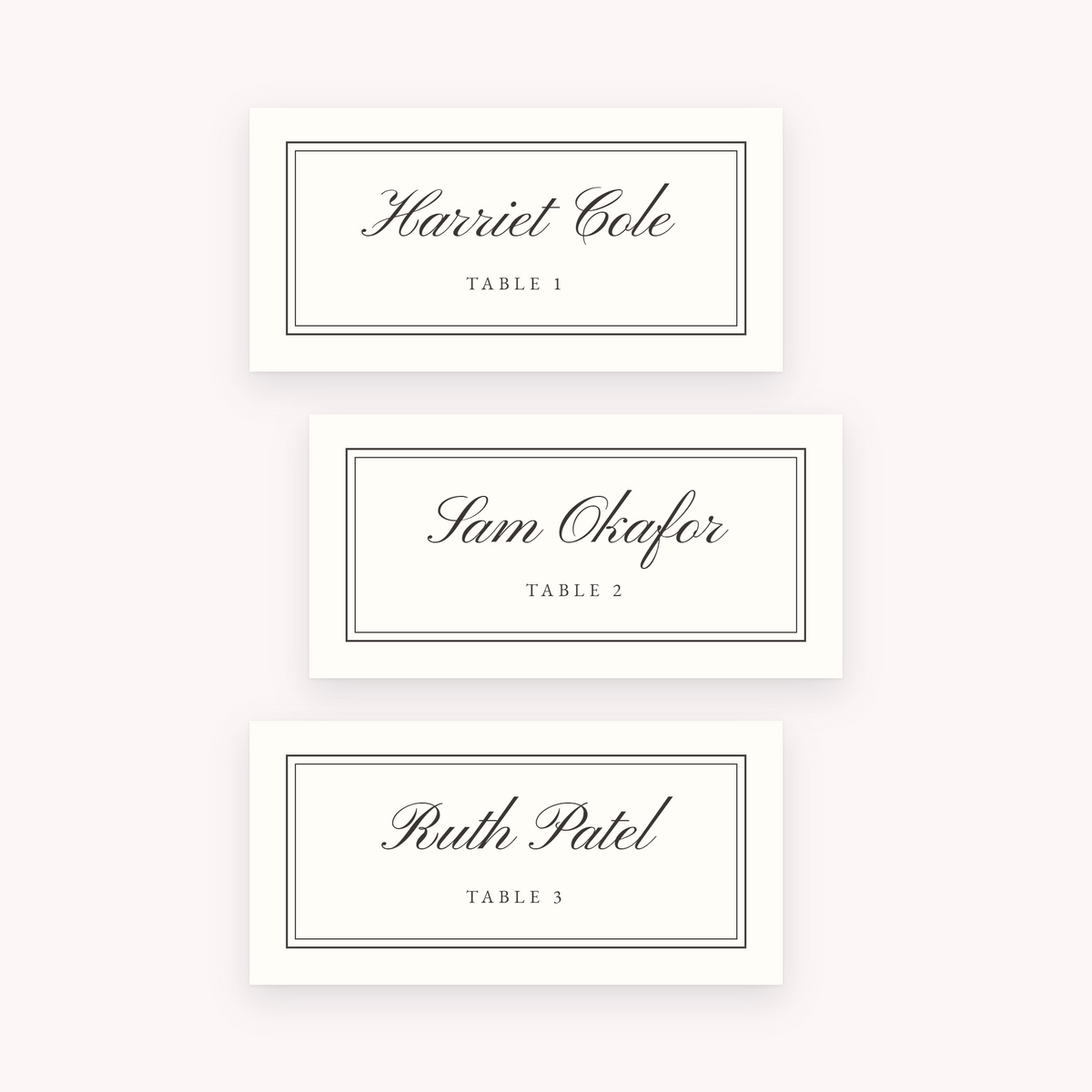 Quire place cards, shown with the sample names Olivia & James